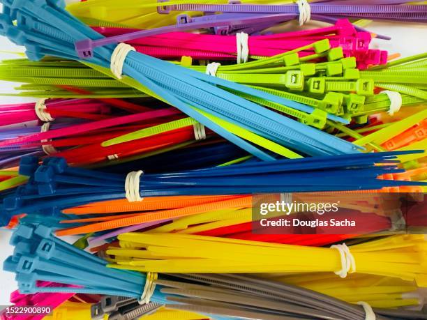 cable ties - nylon single use zip tie - cable fastening stock pictures, royalty-free photos & images