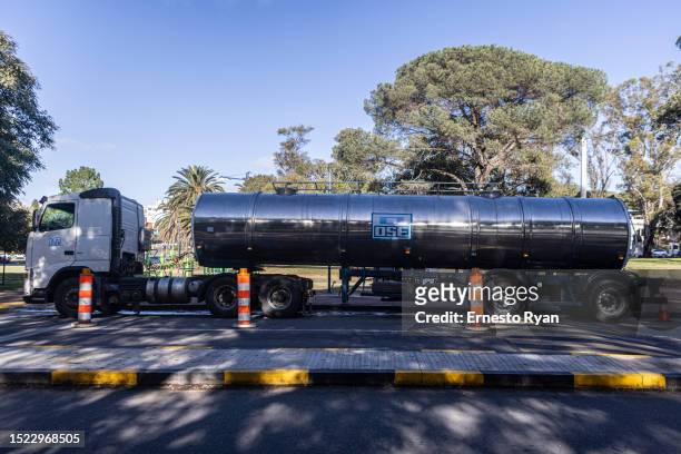 An OSE tank truck that is connected to a water bomb which pumped underground water that is drinkable to supply hospitals on July 07, 2023 in...
