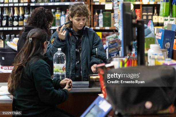 People buy bottled water in a supermarkets as tap water contains high salinity and chemicals on July 06, 2023 in Montevideo, Uruguay. The country...