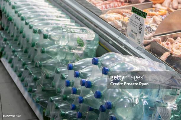 Detail of water bottles at the supermarket as tap water is barely drinkable due to its high salinity and chemicals on July 06, 2023 in Montevideo,...