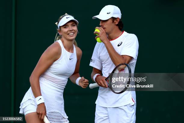 Katie Boulter of Great Britain and partner Alex De Minaur of Australia interact against John Peers of Australia and partner Storm Hunter of Australia...