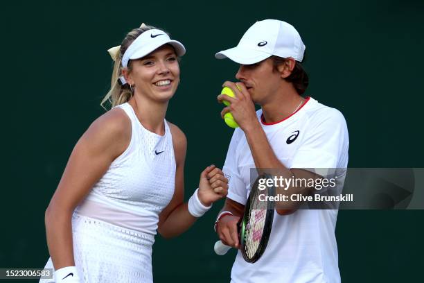 Katie Boulter of Great Britain and partner Alex De Minaur of Australia interact against John Peers of Australia and partner Storm Hunter of Australia...