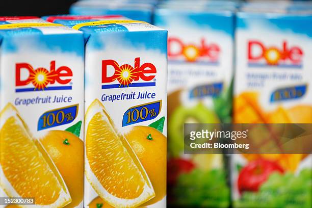Cartons of Dole Food Co. Fruit juice are arranged for a photograph in Soka City, Saitama Prefecture, Japan, on Tuesday, Sept. 18, 2012. Itochu Corp....