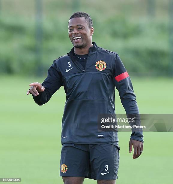Patrice Evra of Manchester United in action during a first team training session ahead of their UEFA Champions League match against Galatasaray at...