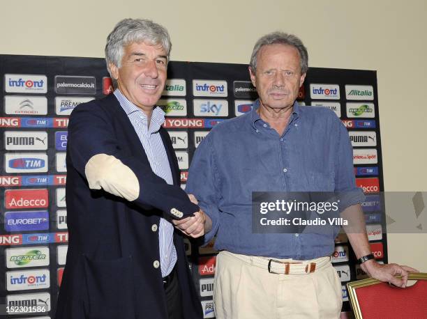 President of Palermo Maurizio Zamparini poses with new coach Gian Piero Gasperini before his presentation on September 18, 2012 in Milan, Italy.