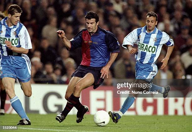 Luis Figo Of Barcelona moves through the midfield during the Spanish Primera Lig A game between Barcelona and Deportivo La Coruna at the Nou Camp...