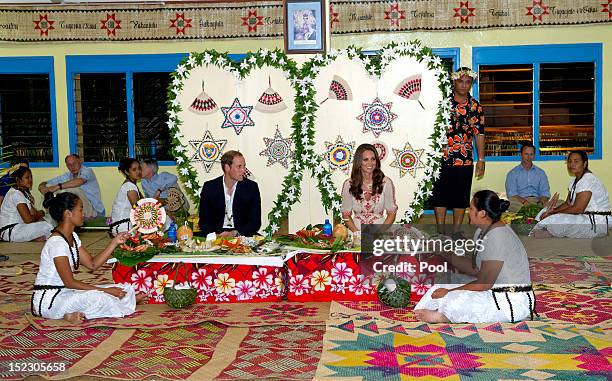 Prince William, Duke of Cambridge and Catherine, Duchess of Cambridge have a traditional dinner at Tausoa Lima Falekaupule on September 18, 2012 in...