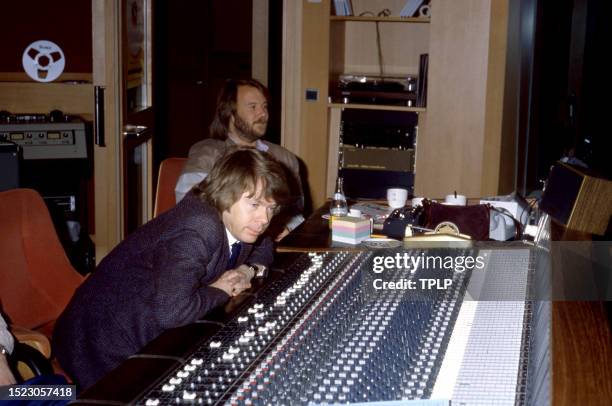 Swedish musicians Björn Ulvaeus and Benny Andersson, of the Swedish supergroup ABBA, sit at the music board at Polar Studios in Stockholm, Sweden,...