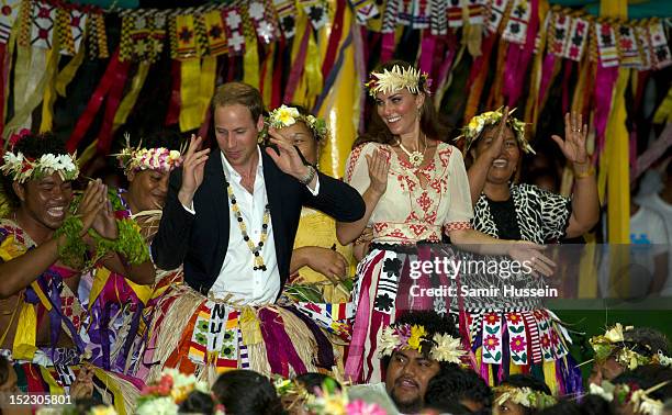 Catherine, Duchess of Cambridge and Prince William, Duke of Cambridge dance with local ladies at a Vaiku Falekaupule Ceremony during the Royal...
