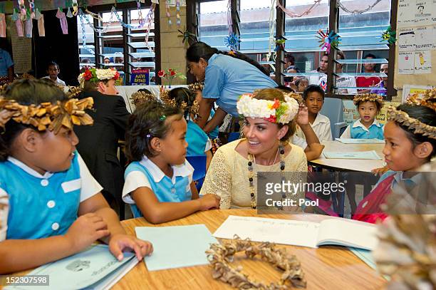 Prince William, Duke of Cambridge and Catherine, Duchess of Cambridge visit Nauti Primary School on September 18, 2012 in Tuvalu. Prince William,...