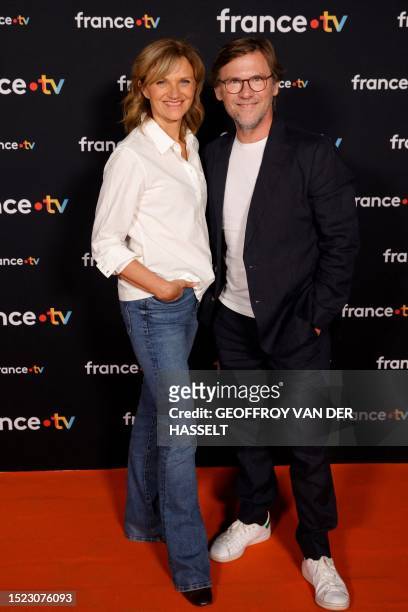 France Televisions' hosts Laurent Romejko and Valerie Maurice pose before a press conference to present the new season of France Televisions...