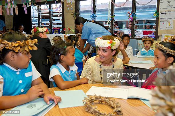 Catherine, Duchess of Cambridge meets children at Nauti Primary School during the Royal couple's Diamond Jubilee tour of the Far East on September...