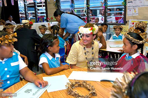 Catherine, Duchess of Cambridge meets children at Nauti Primary School during the Royal couple's Diamond Jubilee tour of the Far East on September...