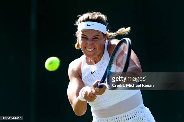 Victoria Azarenka plays a backhand against Daria Kasatkina in the Women's Singles third round match during day five of The Championships Wimbledon...
