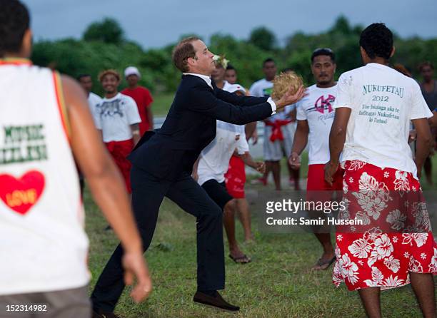 Prince William, Duke of Cambridge plays a game of calle te ano during the Royal couple's Diamond Jubilee tour of the Far East on September 18, 2012...