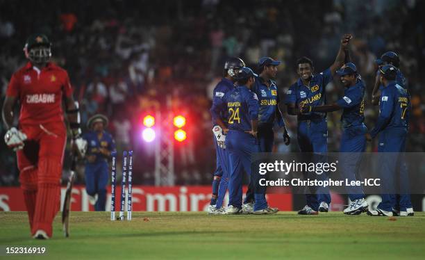 Ajantha Mendis of Sri Lanka celebrates taking the wicket of Hamilton Masakadza of Zimbabwe during the ICC World Twenty20 Cup Group C match between...