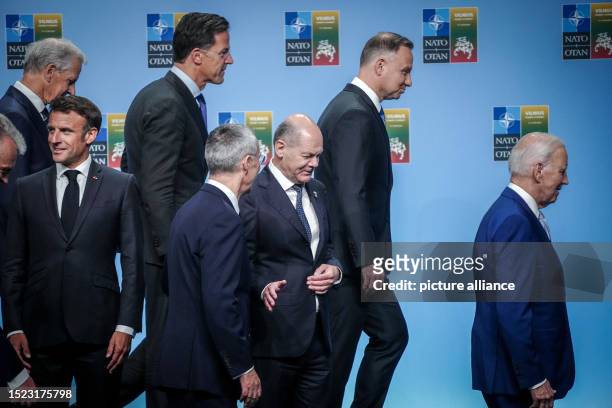 July 2023, Lithuania, Vilnius: French President Emmanuel Macron, Jonas Gahr Støre , Prime Minister of Norway, Mark Rutte, Prime Minister of the...