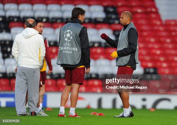 Felipe Riera Albert Riera speaks to Felipe Melo during the Galatasaray training ...