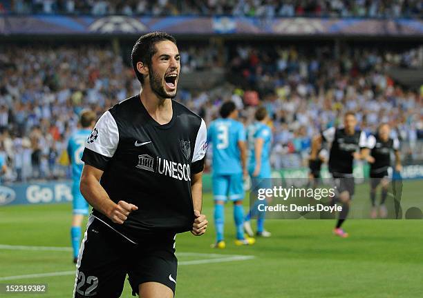 Francisco Alarcon 'Isco' of Malaga CF celebrates after scoring Malaga's opening goal during the UEFA Champions League group C match between Malaga CF...