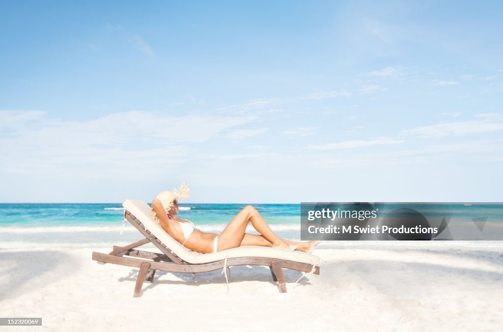 Woman sunbathing beach