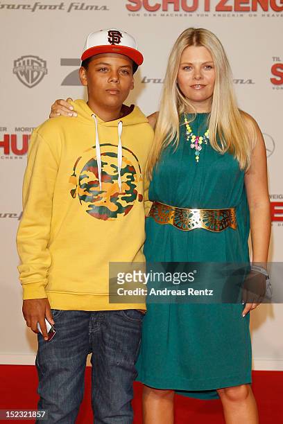 Anne-Sophie Briest and her son Jahmar attend the 'Schutzengel' Premiere at CineStar on September 18, 2012 in Berlin, Germany.