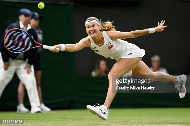 Marie Bouzkova of Czech Republic plays a forehand against Caroline Garcia of France in the Women's Singles third round match during day five of The...