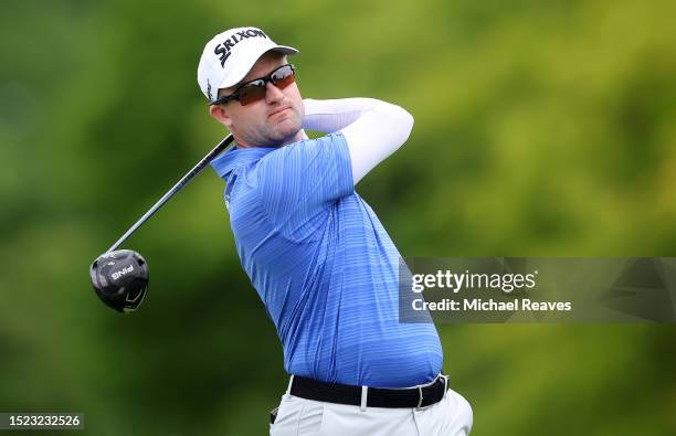 Russell Knox of Scotland plays his shot from the ninth tee during the second round of the John Deere Classic at TPC Deere Run on July 07, 2023 in...