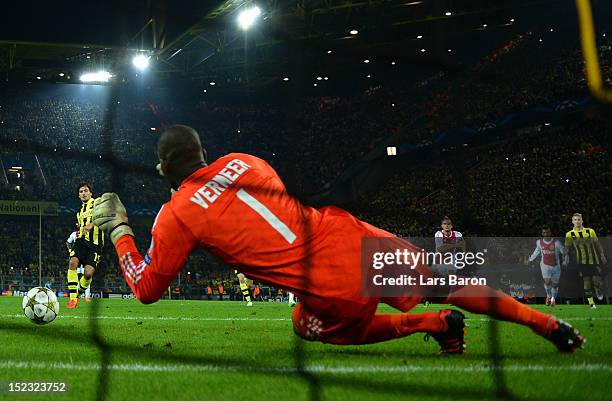 Goalkeeper Kenneth Vermeer of Ajax saves a penalty of Mats Hummels of Dortmund during the UEFA Champions League group D match between Borussia...