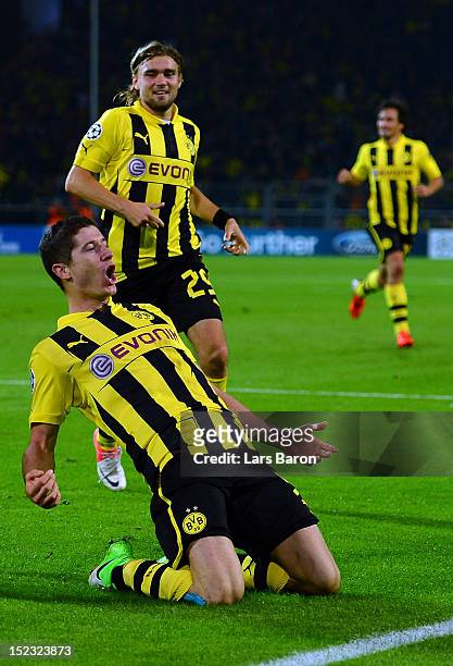 Robert Lewandowski of Dortmund celebrates after scoring his teams first goal during the UEFA Champions League group D match between Borussia Dortmund...