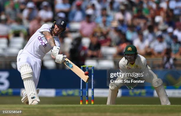 England batsman Ben Stokes hits out for six watched by Alex Carey during day two of the LV= Insurance Ashes 3rd Test Match between England and...