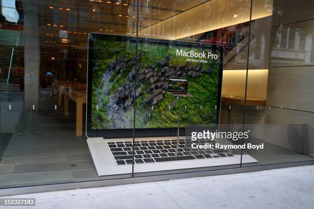 MacBook Pro model display, in the window of the Apple Store, in Chicago, Illinois on SEPTEMBER 16, 2012.