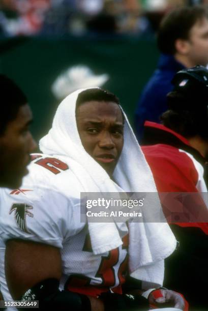 Running Back Jamal Anderson of the Atlanta Falcons follows the action in the game between the Atlanta Falcons vs the New York Jets at The Meadowlands...