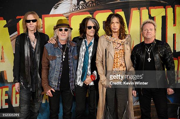 Musicians Tom Hamilton, Brad Whitford, Joe Perry, Steven Tyler and Joey Kramer of Aerosmith pose at the press junket to announce their new album...