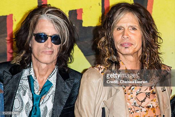 Guitarist Joe Perry and vocalist Steven Tyler of Aerosmith pose at House of Blues Sunset Strip on September 18, 2012 in West Hollywood, California.