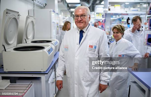 July 2023, Luxembourg, Luxemburg: German President Frank-Walter Steinmeier walks through the Luxembourg Centre for Systems Biomedecine together with...