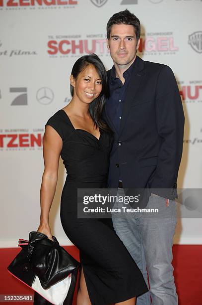 Minh-Khai Phan-Thi and Ansgar Niggemann attends the premiere of 'Schutzengel' at Sony Center on September 18, 2012 in Berlin, Germany.