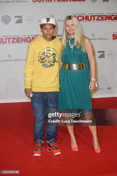 Anne-Sophie Briest and Jahmar Walker attend the premiere of 'Schutzengel' at Sony Center on September 18, 2012 in Berlin, Germany.