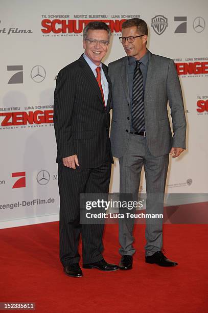 Thomas de Maiziere and Til Schweiger attend the premiere of 'Schutzengel' at Sony Center on September 18, 2012 in Berlin, Germany.