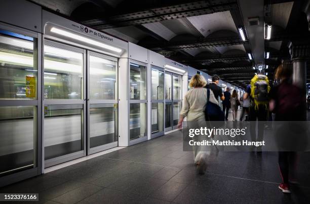 Metro train arrives at the station Porte d'Orleans on July 07, 2023 in Paris, France. Paris will host the Summer Olympics from July 26 till August...