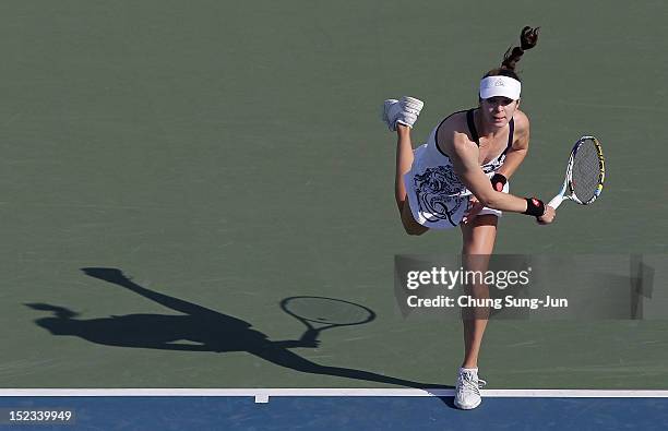 Galina Voskoboeva of Kazakhstan serves to Kaia Kanepi of Estonia during day two of the KDB Korea Open at Olympic Park Tennis Stadium on September 19,...