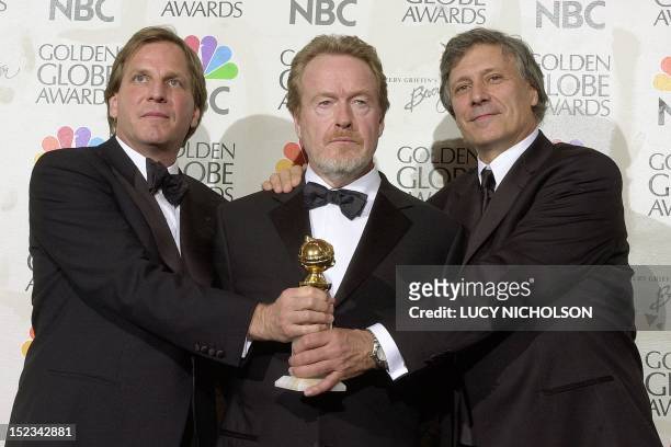 Producers Doug Wick and David Franzoni join director Ridley Scott after their film "Gladiator" was awarded Best Motion Picture- Drama during the 58th...