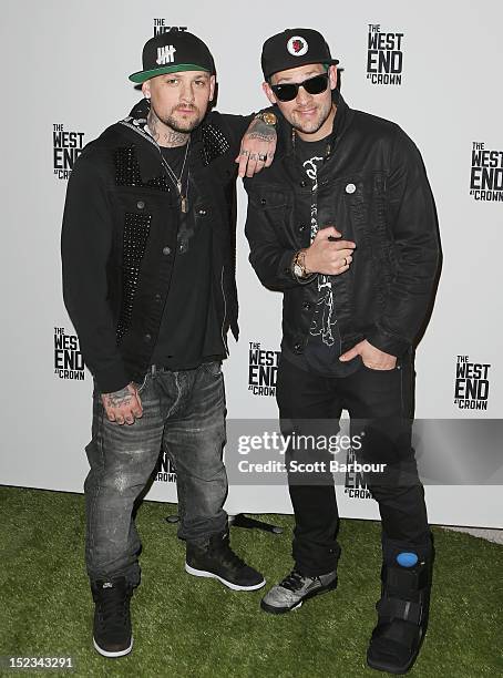 Joel Madden and Benji Madden of Good Charlotte attend Footy at The West End on September 19, 2012 in Melbourne, Australia.