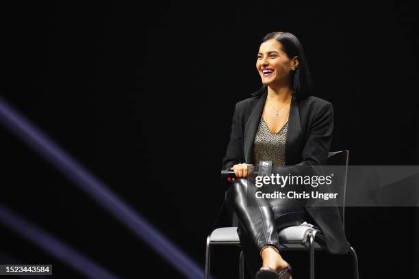 Reporter Megan Olivi hosts a Q&A session prior to the UFC 290 ceremonial weigh-in at T-Mobile Arena on July 07, 2023 in Las Vegas, Nevada.