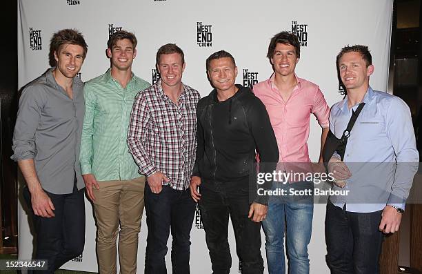 Geelong Cats AFL players Tom Hawkins, Steve Johnson, Andrew Mackie and Joel Selwood pose with boxer Danny Green as they attend Footy at The West End...