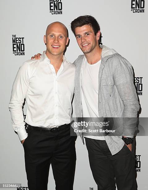 Players Gary Ablett and Trent Cotchin attend Footy at The West End on September 19, 2012 in Melbourne, Australia.