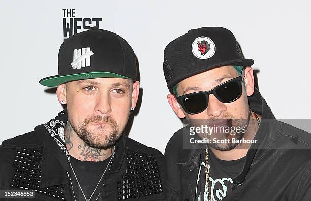 Joel Madden and Benji Madden of Good Charlotte attend Footy at The West End on September 19, 2012 in Melbourne, Australia.