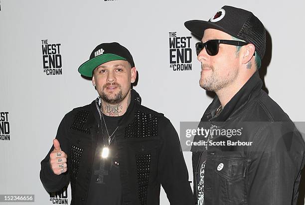 Joel Madden and Benji Madden of Good Charlotte attend Footy at The West End on September 19, 2012 in Melbourne, Australia.