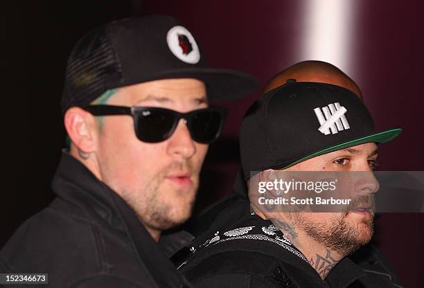 Joel Madden and Benji Madden of Good Charlotte attend Footy at The West End on September 19, 2012 in Melbourne, Australia.