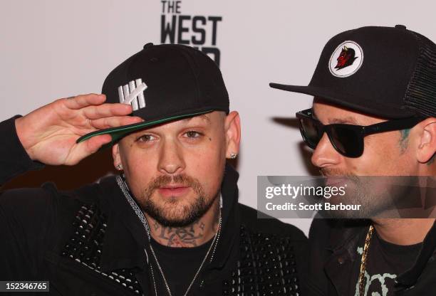 Joel Madden and Benji Madden of Good Charlotte attend Footy at The West End on September 19, 2012 in Melbourne, Australia.