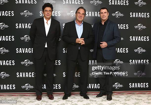 Benicio Del Toro, Oliver Stone and John Travolta attend a photocall for new film 'Savages' at The Mandarin Oriental on September 19, 2012 in London,...